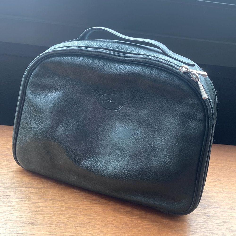 Longchamp leather toiletries & makeup bag.